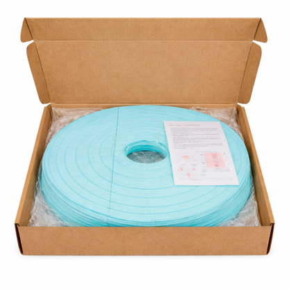 Open cardboard box containing a turquoise blue lanterns