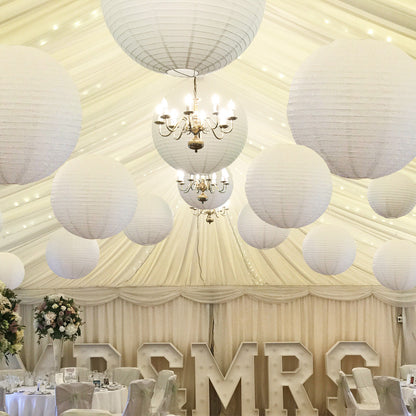 Hanging paper lanterns in pure white